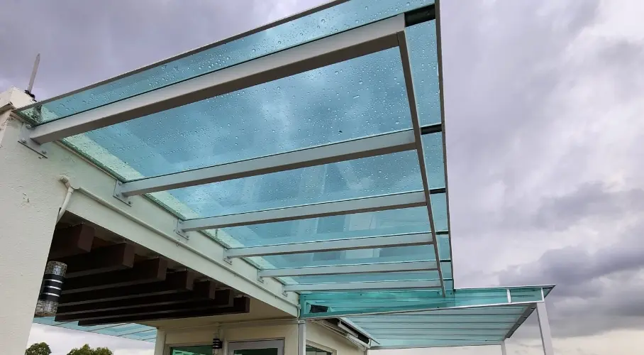 Polycarbonate awning installation work in progress
