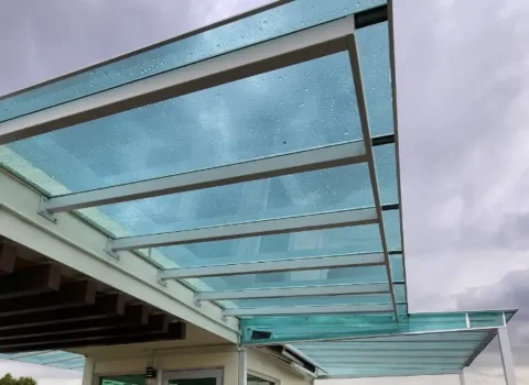 Polycarbonate awning installation work in progress