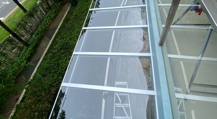 Polycarbonate awning weather protection system
